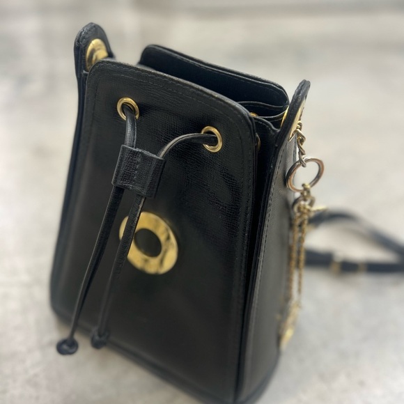Small Black Crossbody Bag with Gold Accents and Drawstring Closure - Picture 12 of 13